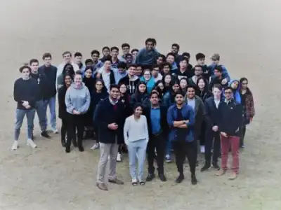 A large group of AT Academy alumni